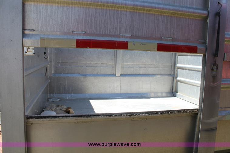 image for item D7911 2000 Kahn Versahall 20' tandem axle dump trailer