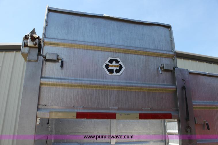 image for item D7911 2000 Kahn Versahall 20' tandem axle dump trailer