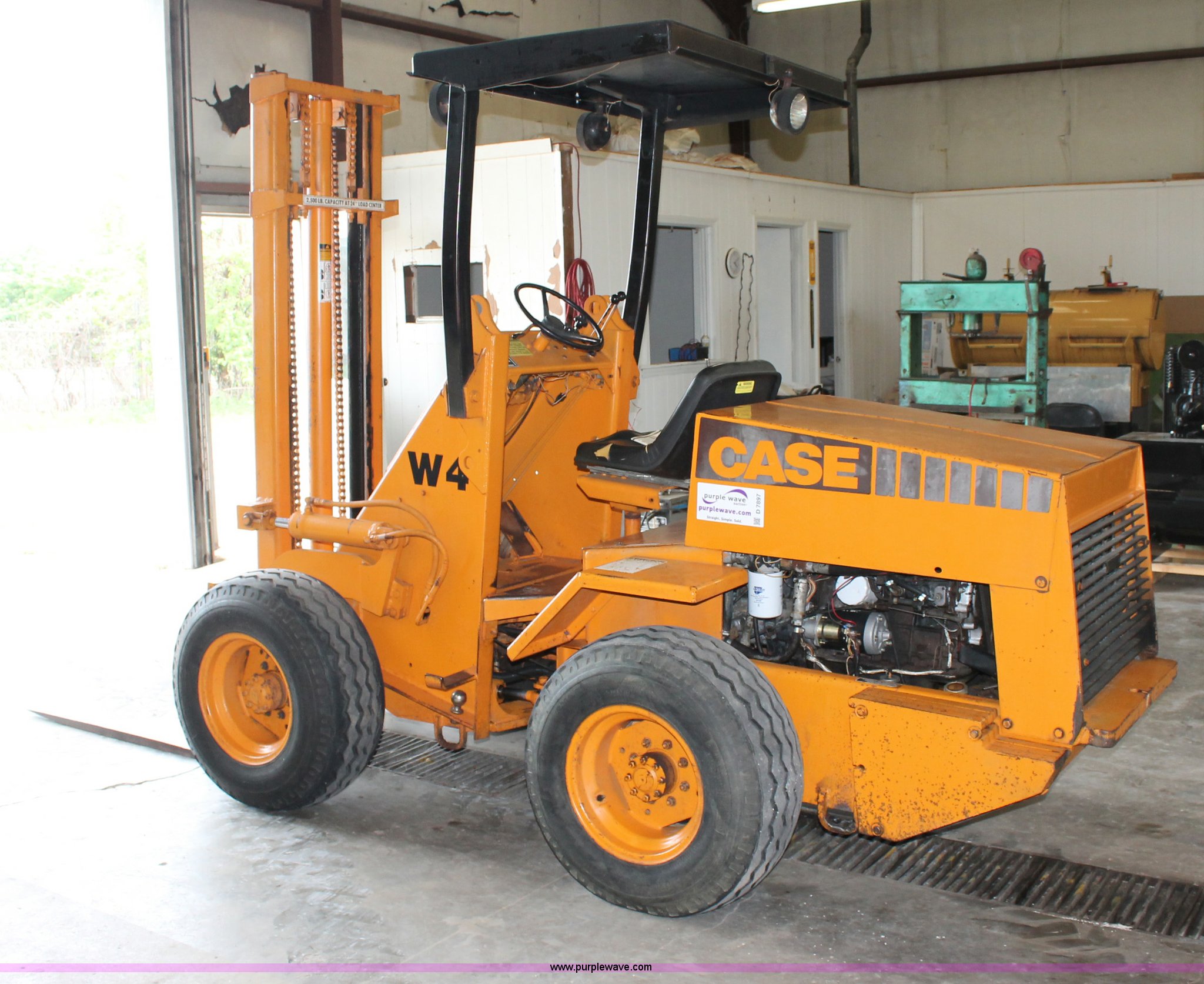 Case W4 580E articulated forklift in Harrisonville, MO Item D7897