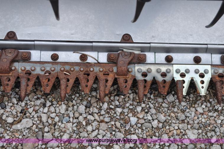 image for item A5906 2006 John Deere 635F HydraFlex 35' header