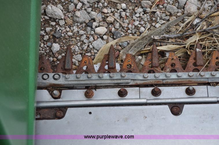 image for item A5906 2006 John Deere 635F HydraFlex 35' header