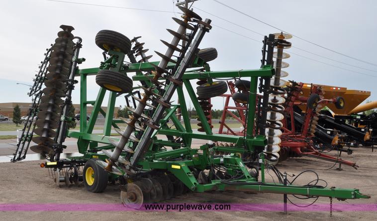 image for item A5908 2009 John Deere 637 Wheat Land 35' disk