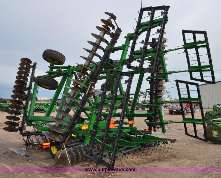 image for item A5908 2009 John Deere 637 Wheat Land 35' disk