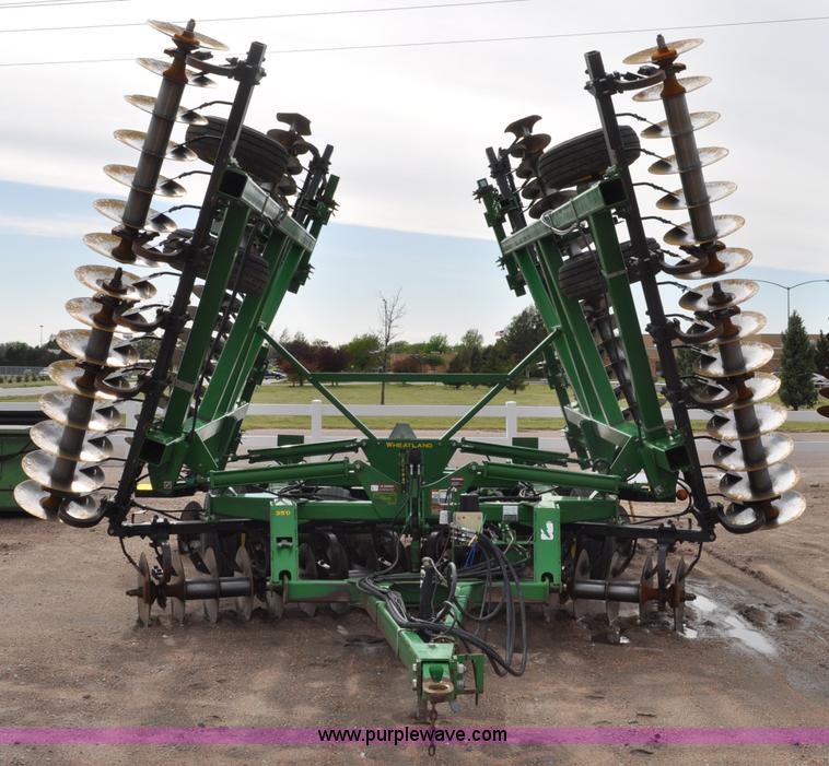 image for item A5908 2009 John Deere 637 Wheat Land 35' disk