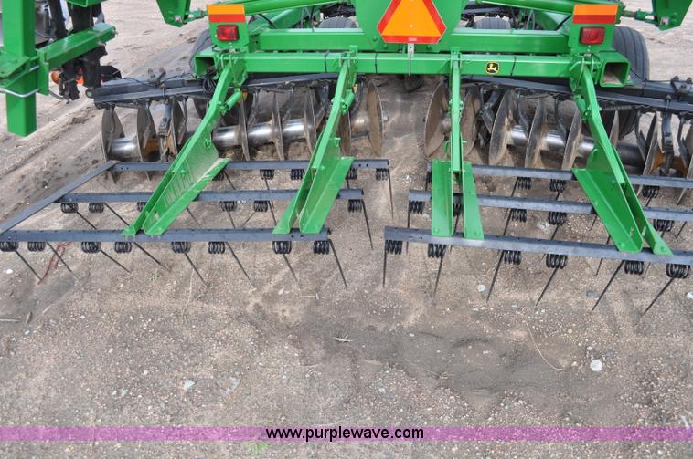 image for item A5908 2009 John Deere 637 Wheat Land 35' disk