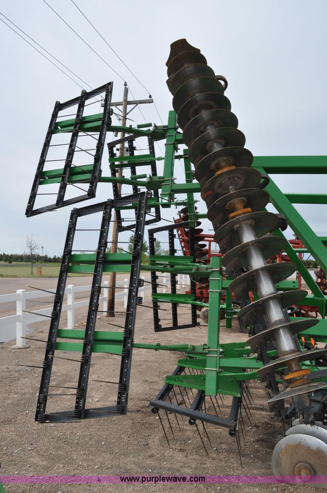 image for item A5908 2009 John Deere 637 Wheat Land 35' disk