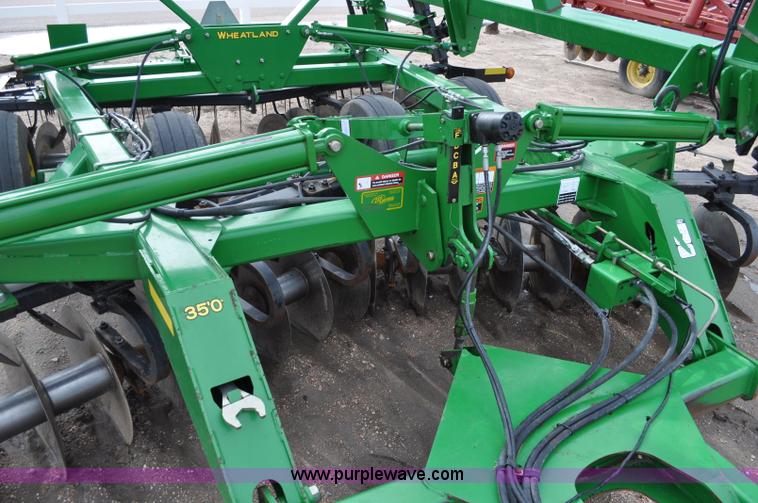 image for item A5908 2009 John Deere 637 Wheat Land 35' disk