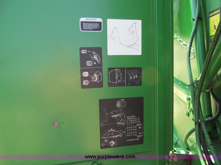 image for item D3242 1993 John Deere 535 round baler