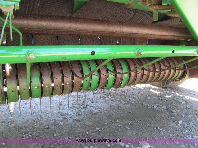 image for item D3242 1993 John Deere 535 round baler