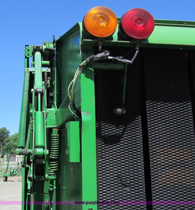 image for item D3242 1993 John Deere 535 round baler