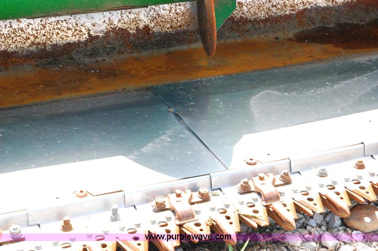 image for item D3245 2006 John Deere 630F 30' flex platform header