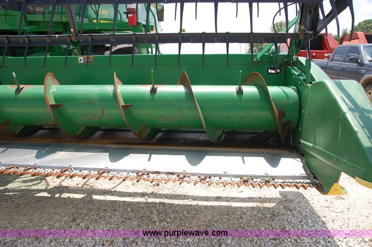 image for item D3245 2006 John Deere 630F 30' flex platform header