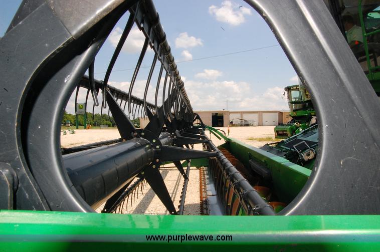 image for item D3245 2006 John Deere 630F 30' flex platform header