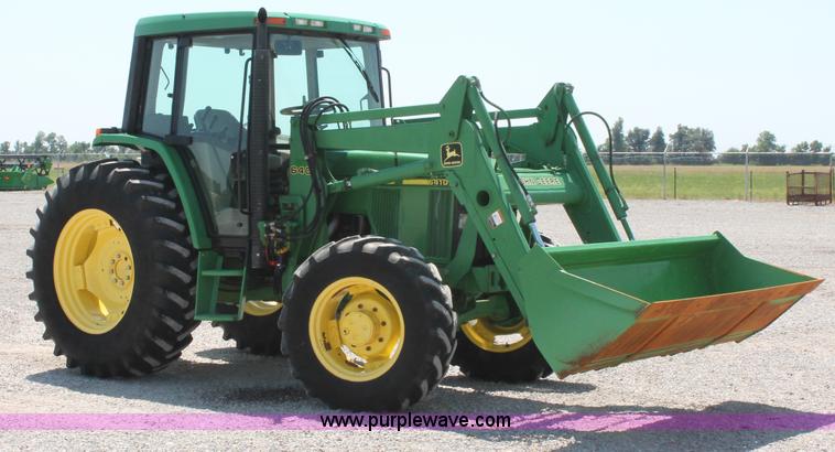 image for item D3246 2001 John Deere 6410 MFWD tractor