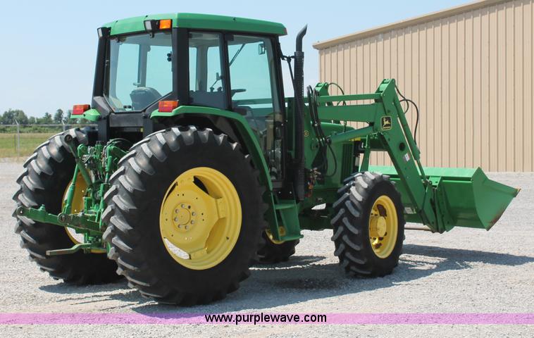 image for item D3246 2001 John Deere 6410 MFWD tractor