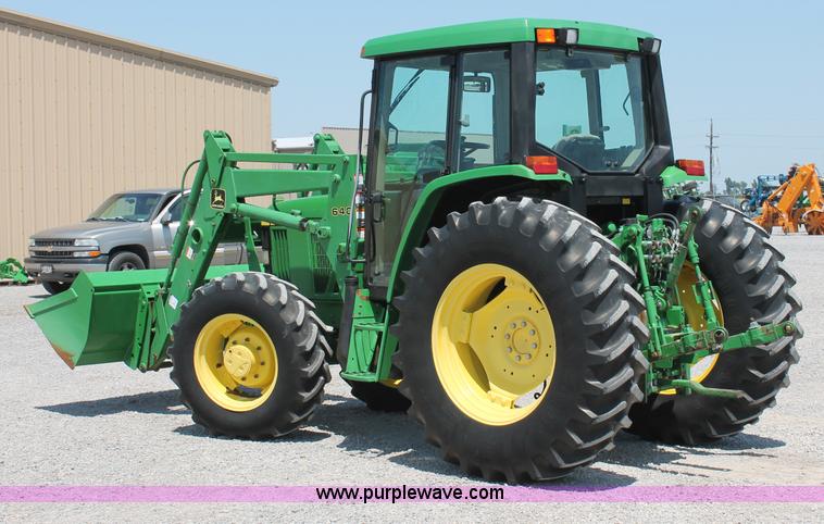 image for item D3246 2001 John Deere 6410 MFWD tractor