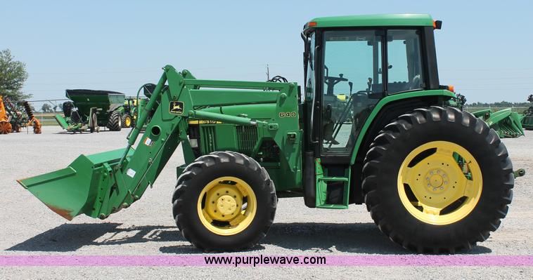 image for item D3246 2001 John Deere 6410 MFWD tractor
