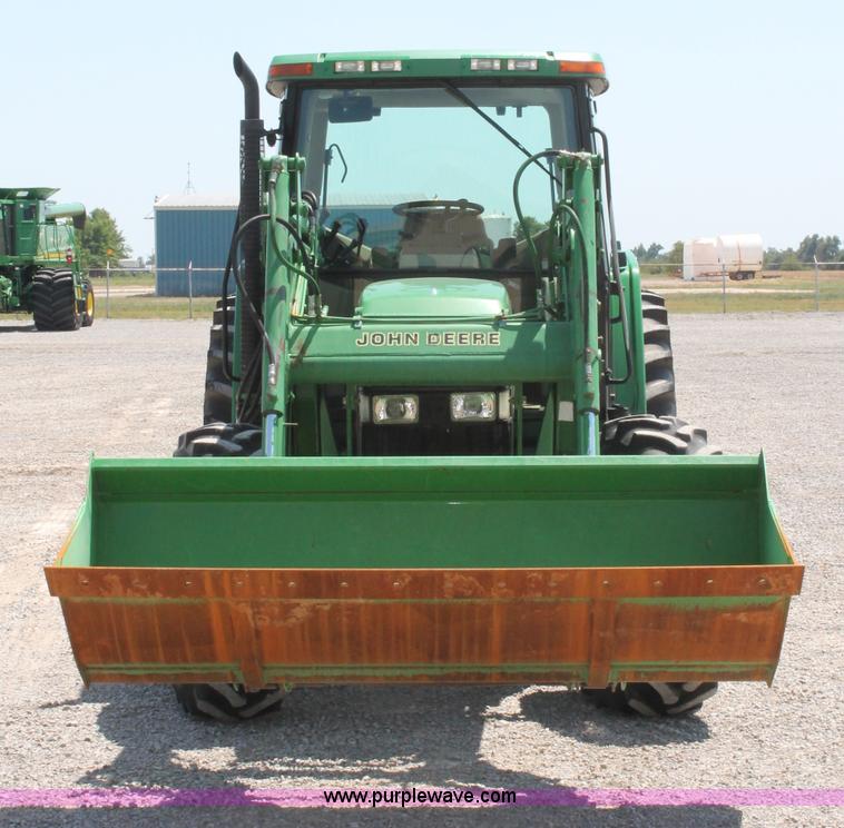 image for item D3246 2001 John Deere 6410 MFWD tractor