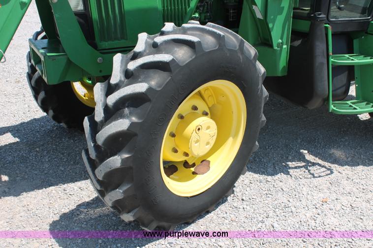 image for item D3246 2001 John Deere 6410 MFWD tractor