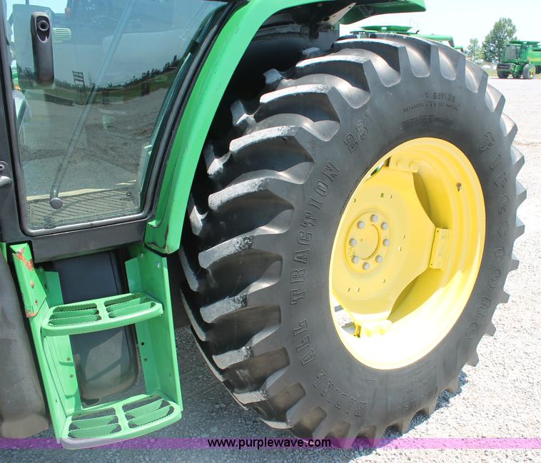 image for item D3246 2001 John Deere 6410 MFWD tractor