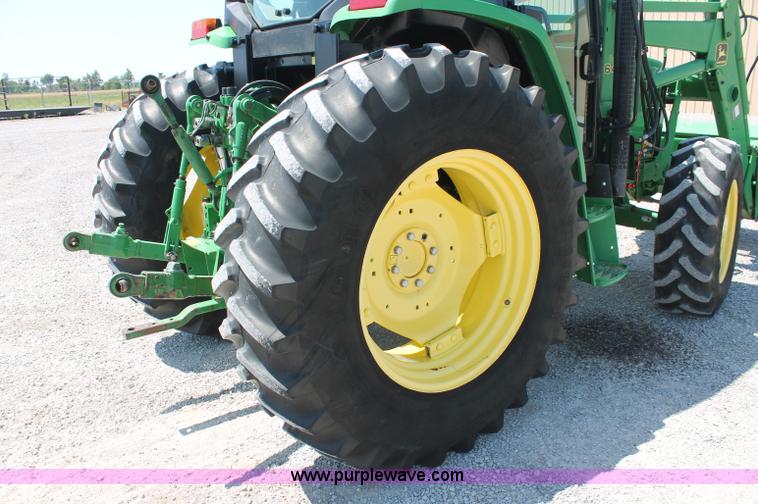 image for item D3246 2001 John Deere 6410 MFWD tractor