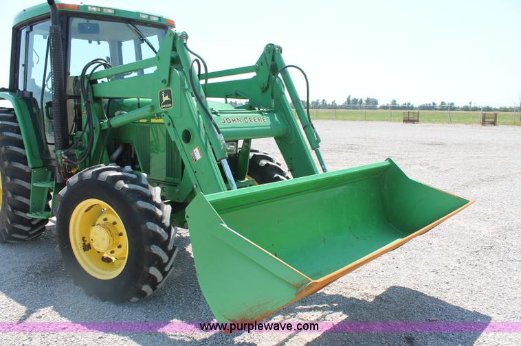 image for item D3246 2001 John Deere 6410 MFWD tractor