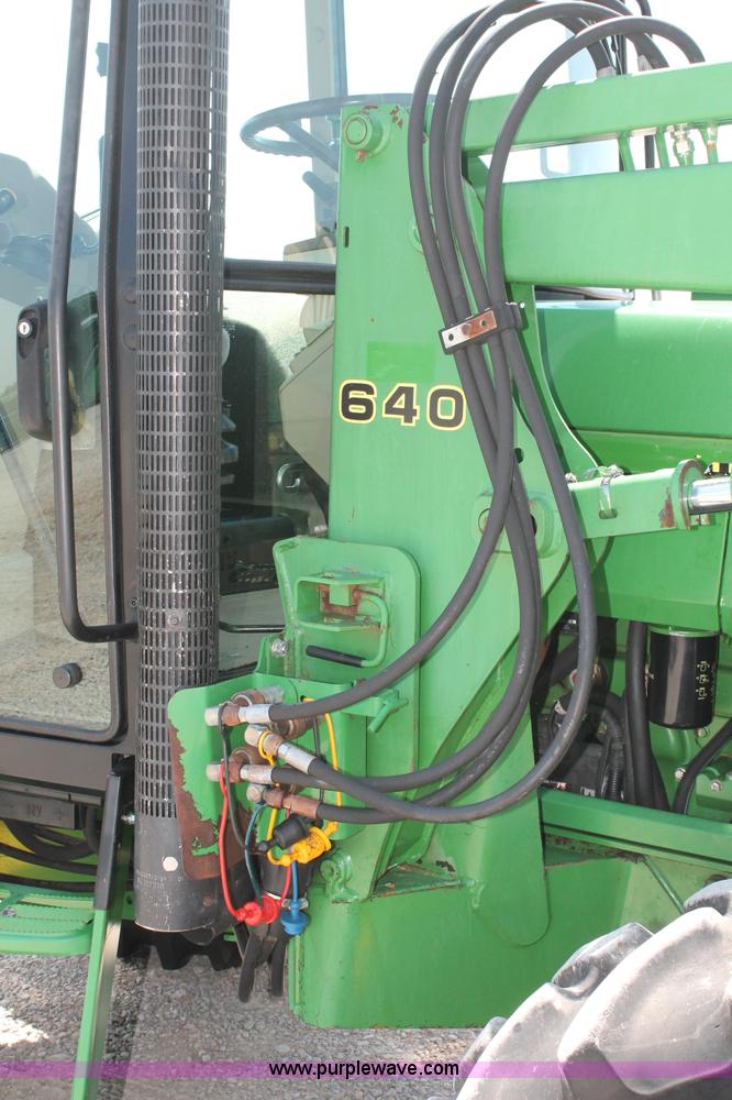 image for item D3246 2001 John Deere 6410 MFWD tractor