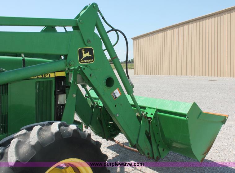 image for item D3246 2001 John Deere 6410 MFWD tractor