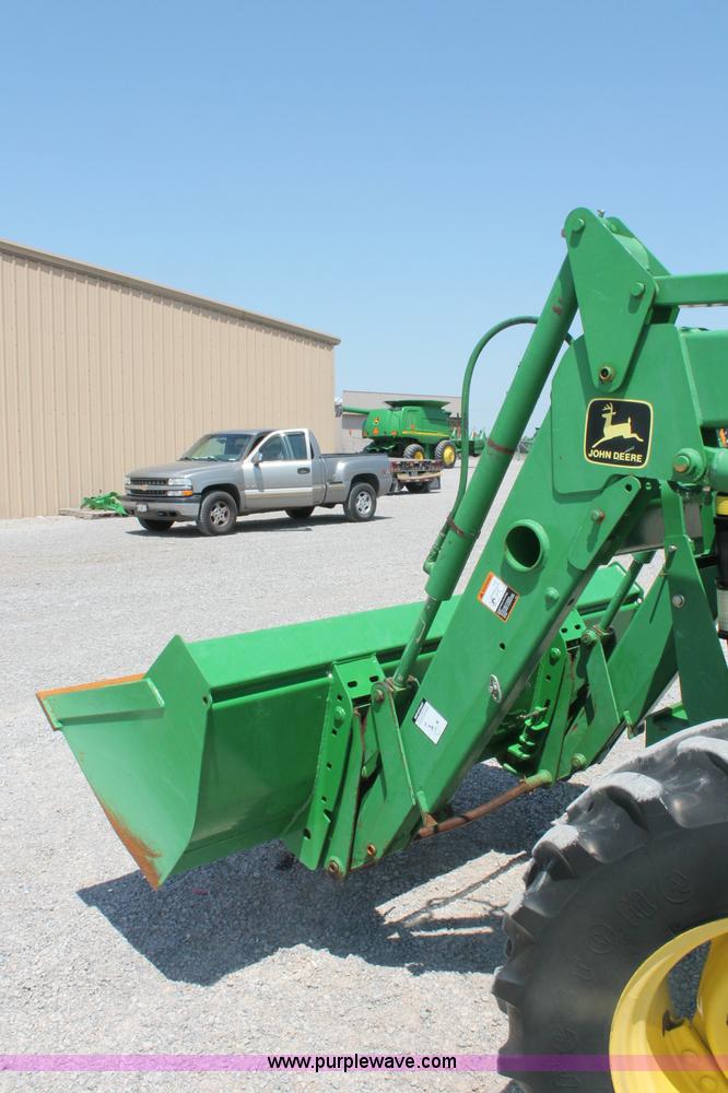 image for item D3246 2001 John Deere 6410 MFWD tractor