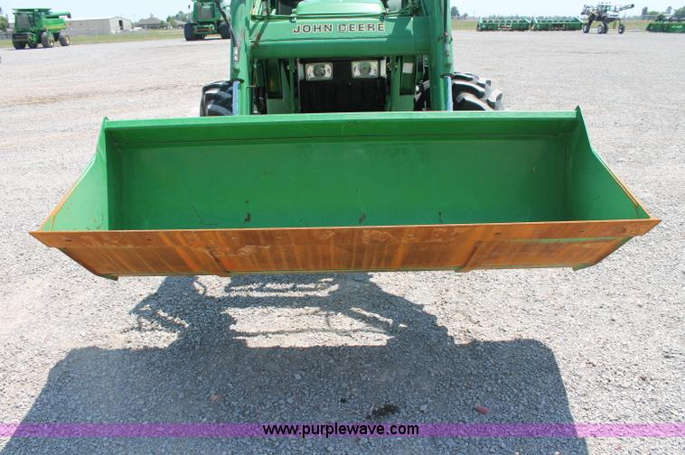 image for item D3246 2001 John Deere 6410 MFWD tractor