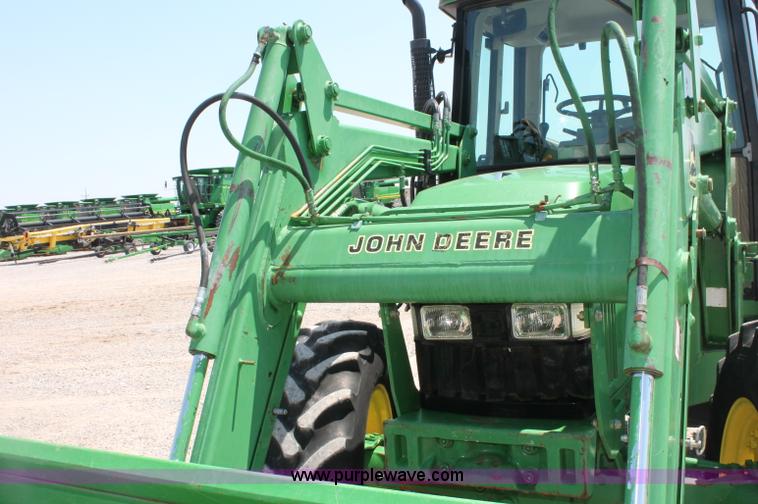 image for item D3246 2001 John Deere 6410 MFWD tractor