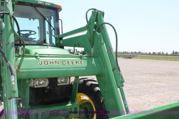 image for item D3246 2001 John Deere 6410 MFWD tractor