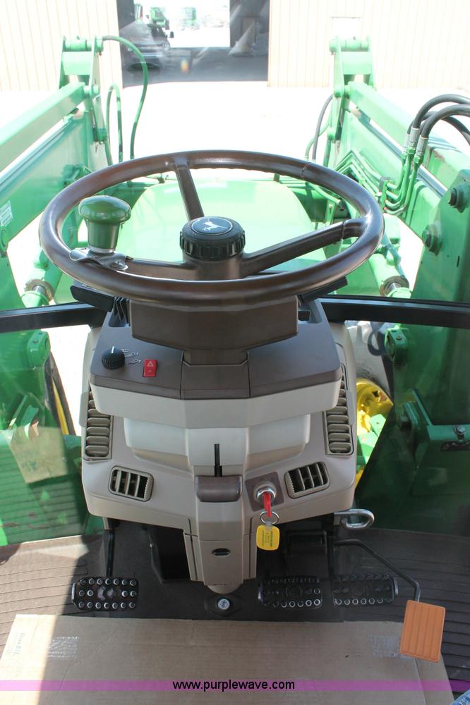 image for item D3246 2001 John Deere 6410 MFWD tractor