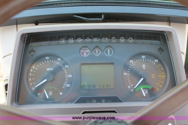 image for item D3246 2001 John Deere 6410 MFWD tractor