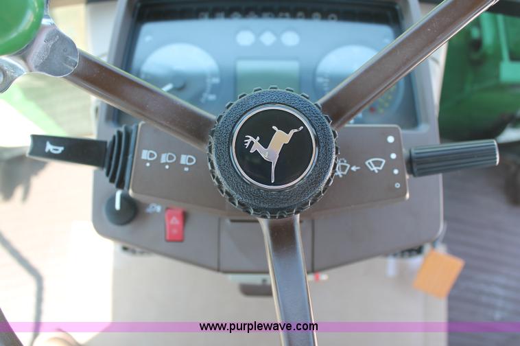 image for item D3246 2001 John Deere 6410 MFWD tractor