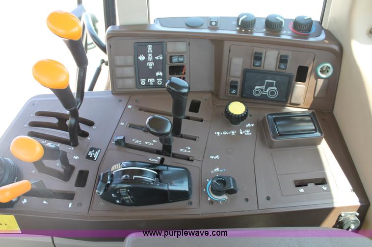 image for item D3246 2001 John Deere 6410 MFWD tractor