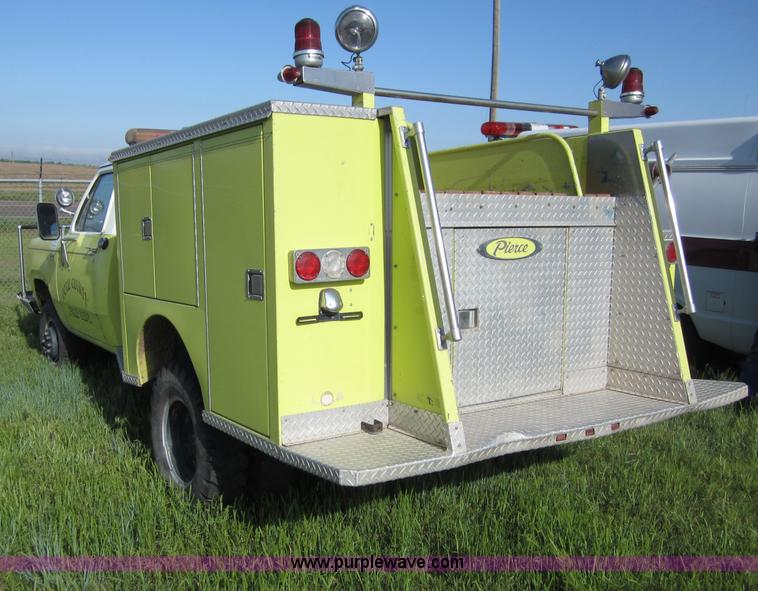 image for item B3233 1975 Dodge W30 mini pumper fire truck
