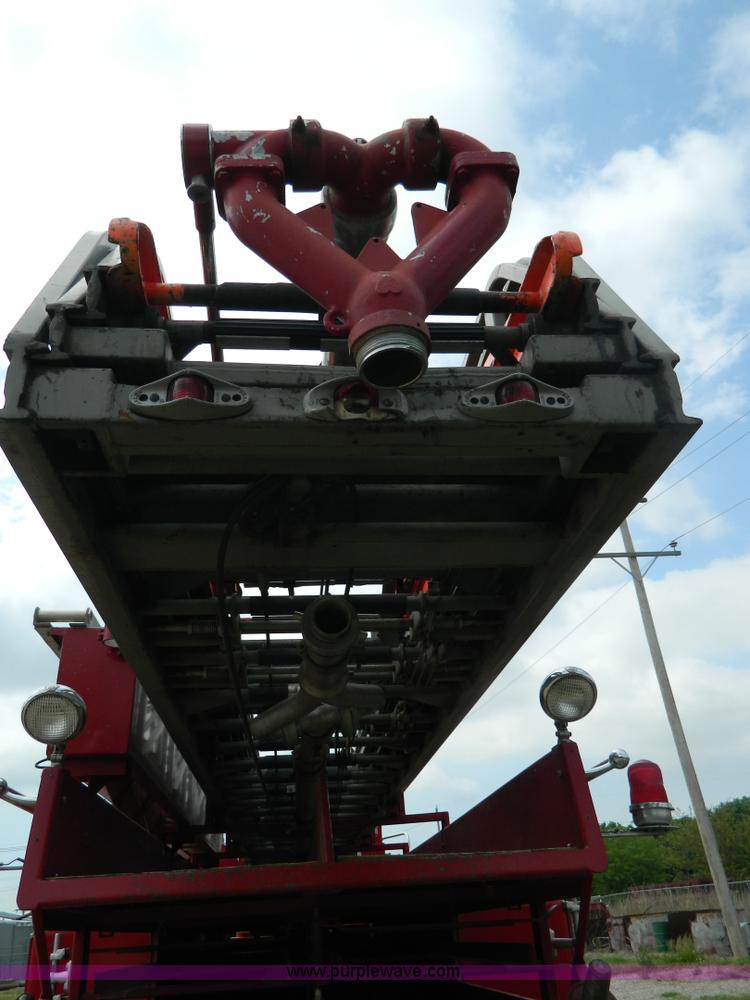 image for item B3672 1973 American LaFrance 100' ladder truck