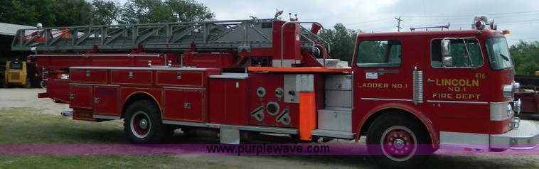 image for item B3672 1973 American LaFrance 100' ladder truck