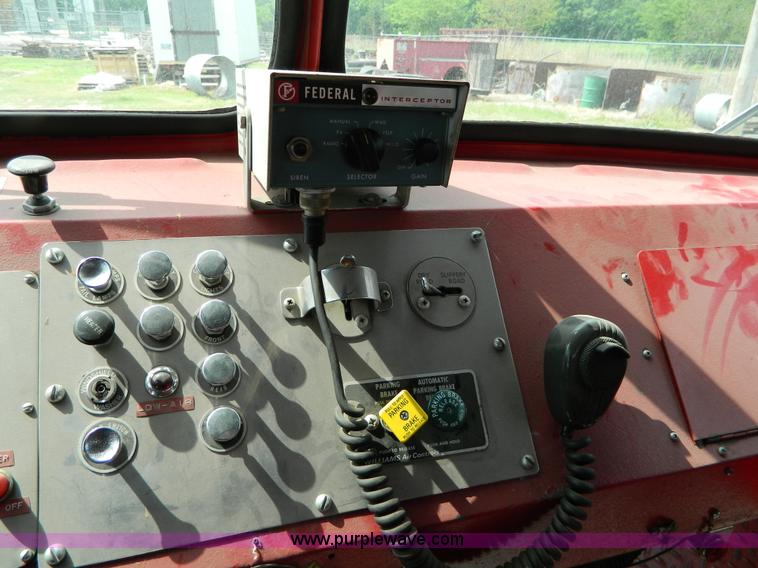 image for item B3672 1973 American LaFrance 100' ladder truck