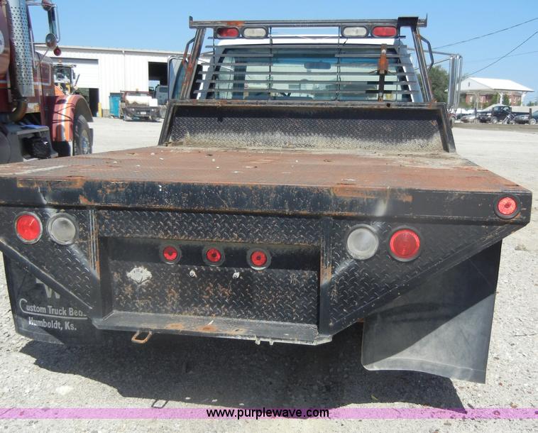 image for item D4097 1990 GMC Sierra 3500 SL flatbed pickup truck