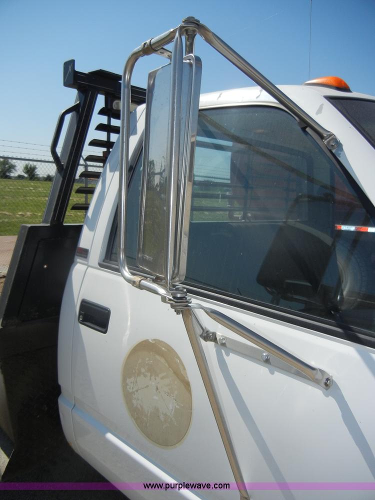 image for item D4097 1990 GMC Sierra 3500 SL flatbed pickup truck