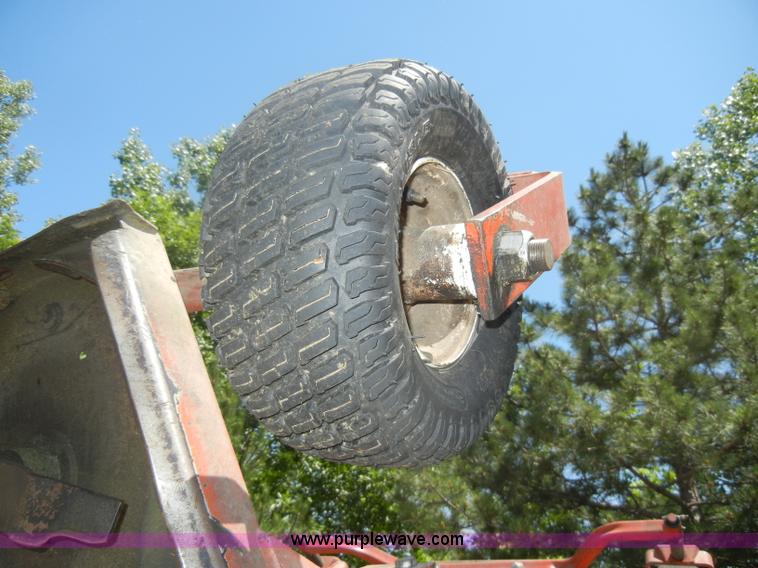 image for item D4105 Rhino TX145 grounds keeper mower