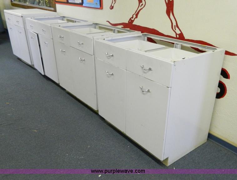 image for item T9857 (4) 36"W metal base cabinets