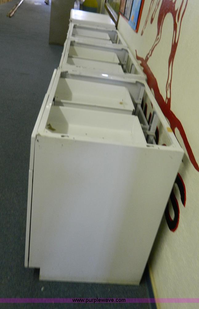 image for item T9857 (4) 36"W metal base cabinets