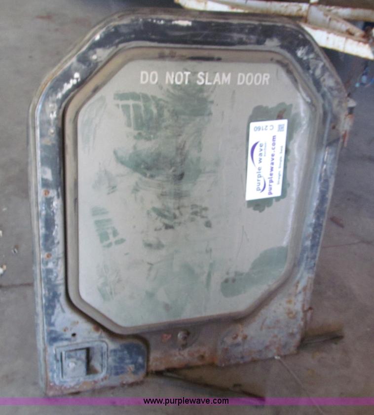 Bobcat 763 door in Raytown, MO Item C2160 sold Purple Wave