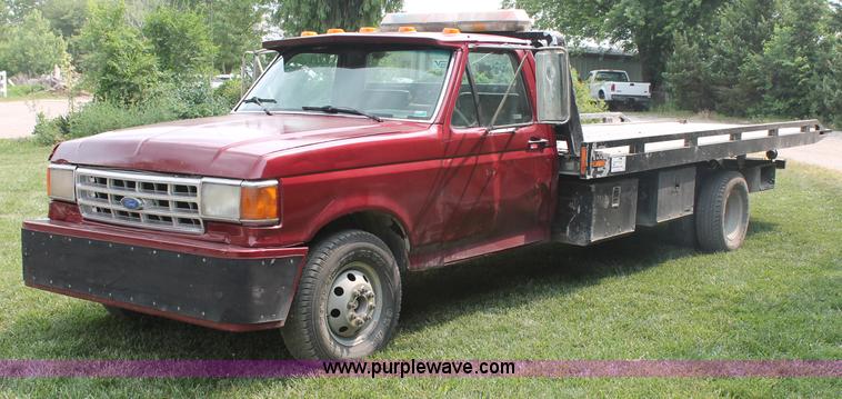 image for item C2525 1990 Ford F350 roll back truck