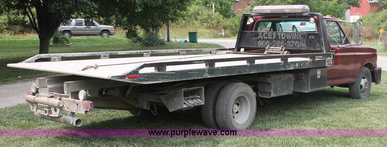 image for item C2525 1990 Ford F350 roll back truck