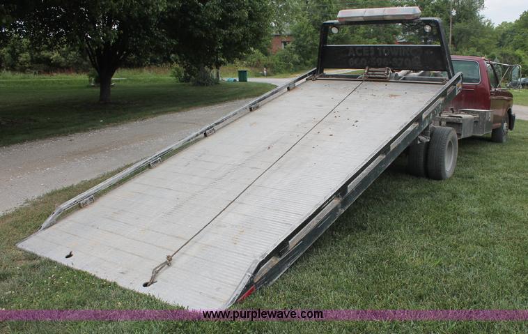 image for item C2525 1990 Ford F350 roll back truck