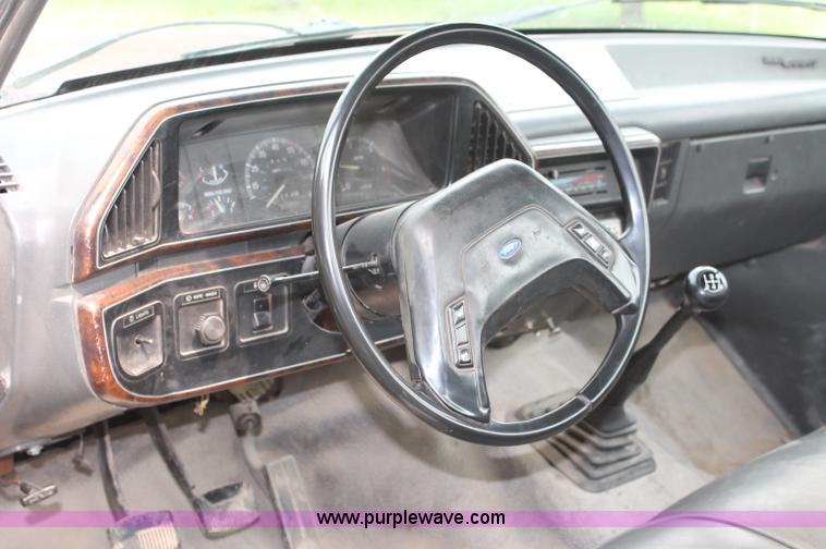 image for item C2525 1990 Ford F350 roll back truck